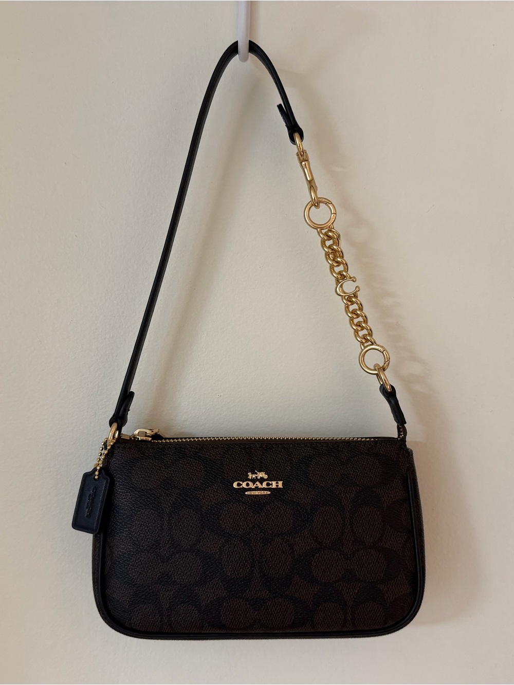 COACH Nolita in Signature Canvas + Signature Strap Extender
